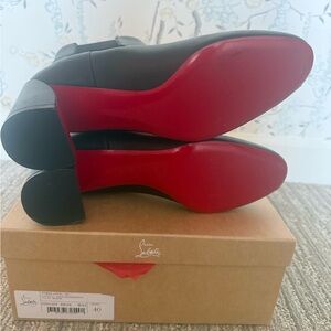 Christian Louboutin Black Heeled Boots with Red Soles